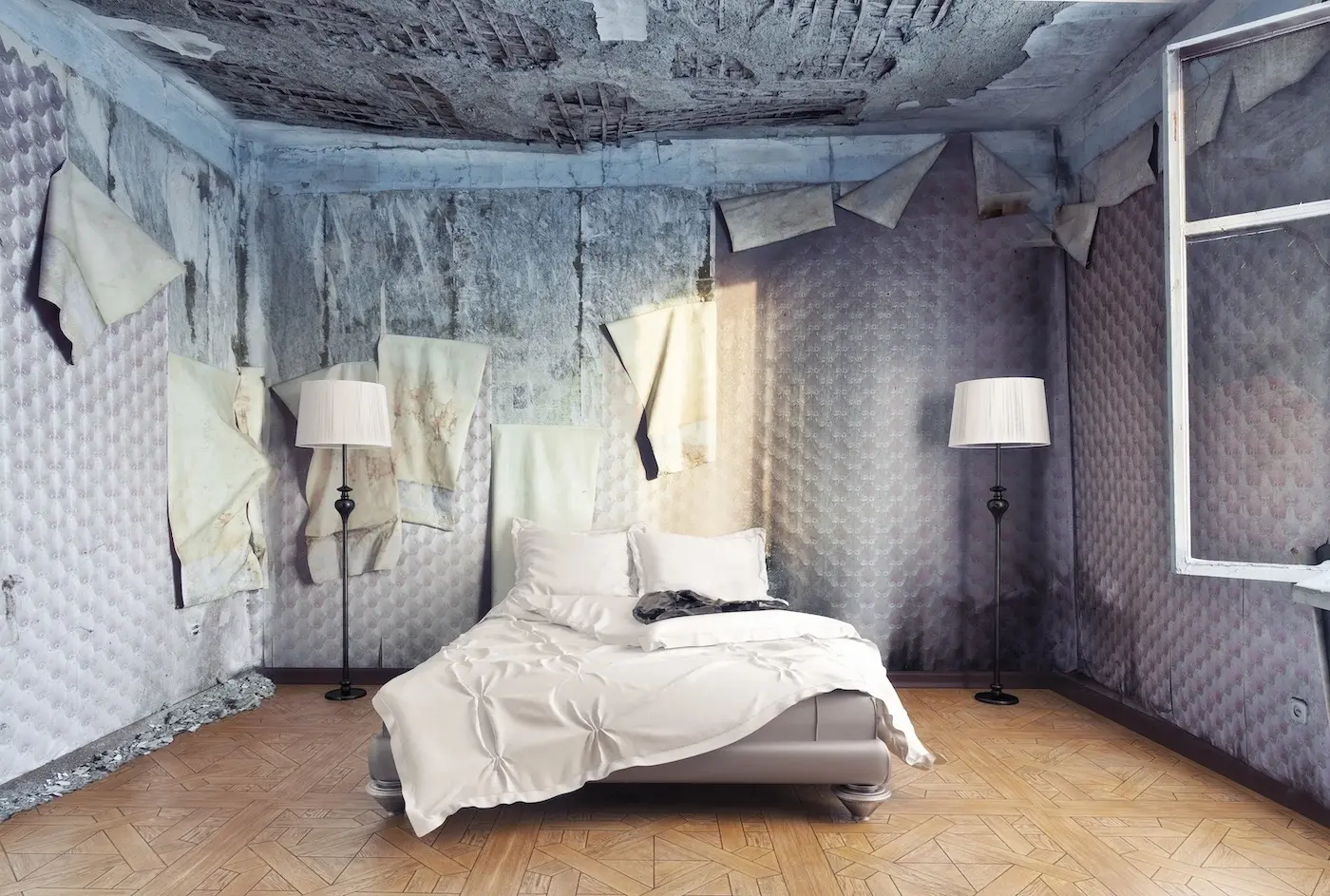 Severely damaged apartment bedroom with peeling wallpaper, mold, and structural decay